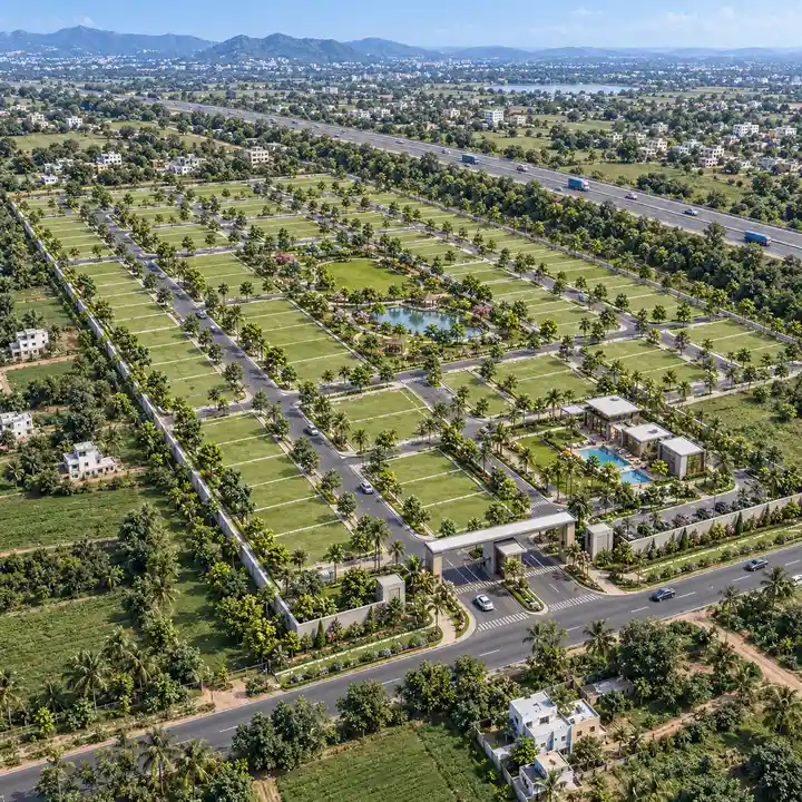 Concorde Doddaballapur aerial view of a long plotted layout with a central park, a clubhouse cluster and a ring-road bypass beyond, artist's impression Concorde Doddaballapur aerial view of a long plotted layout with a central park, a clubhouse cluster and a ring-road bypass beyond, artist's impression